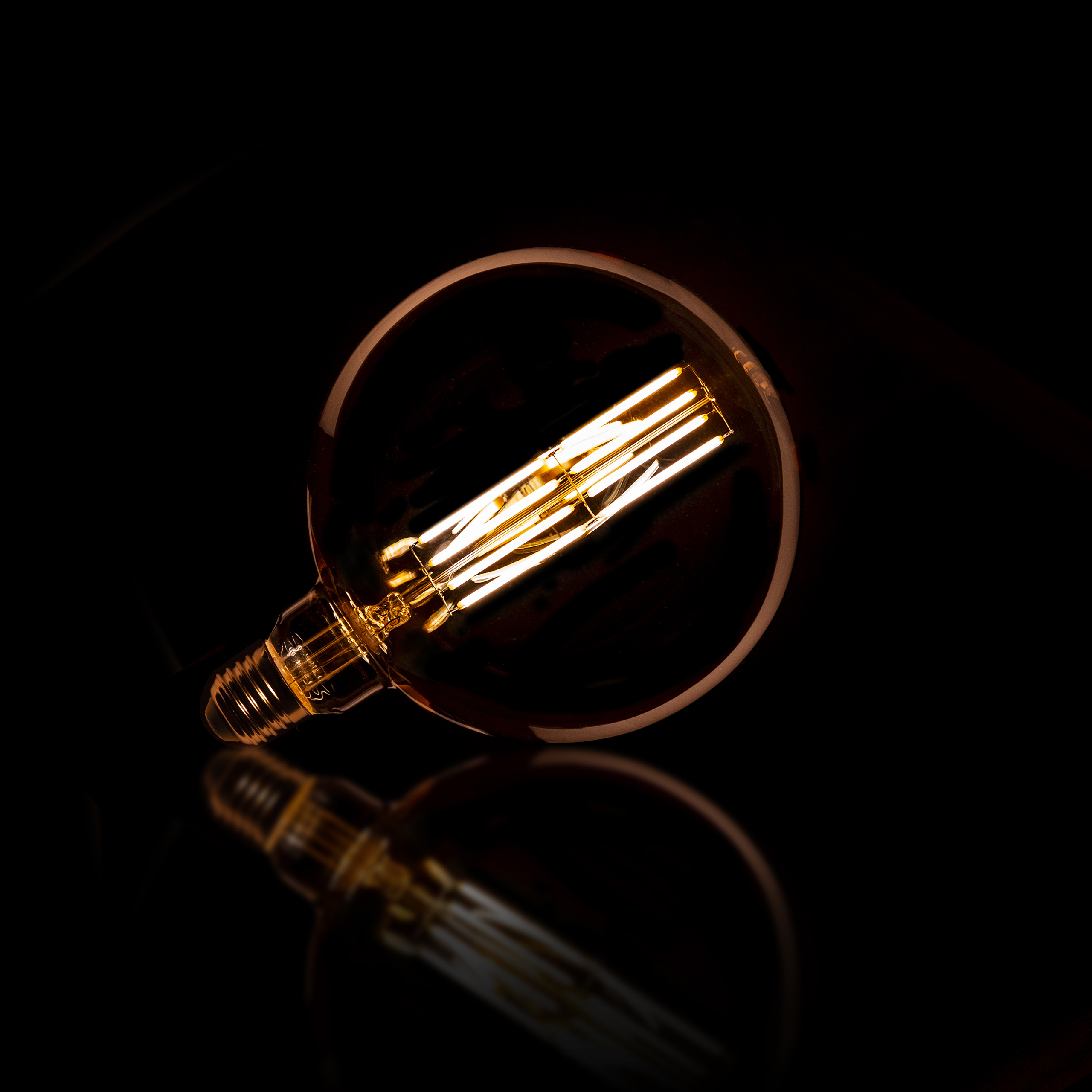 Sorgente luminosa LED [G150] sfera con filamento Ø15 / Vetro ambrato