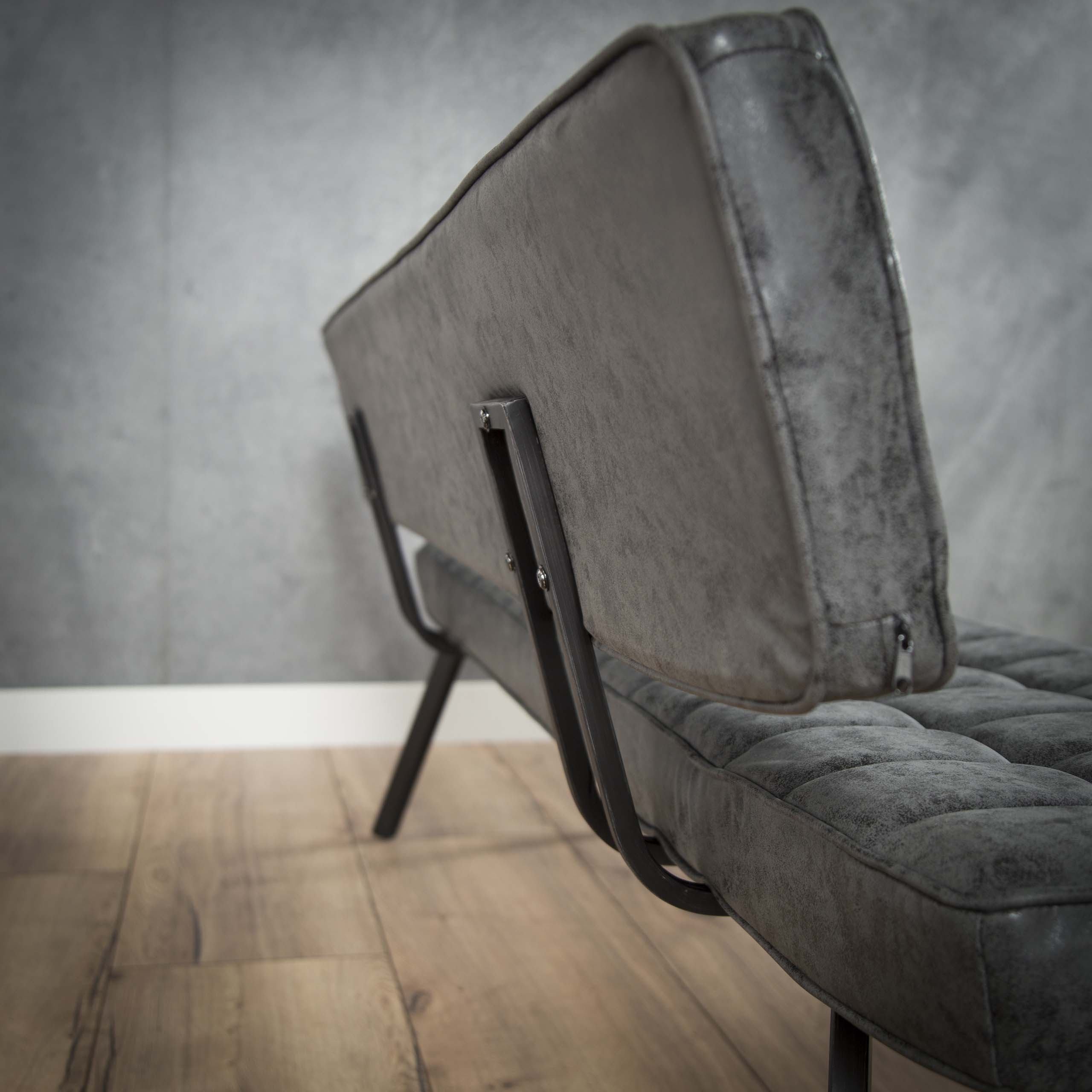 Dining room sofa 180 cm with cross stitching and an open back. / Wax PU black